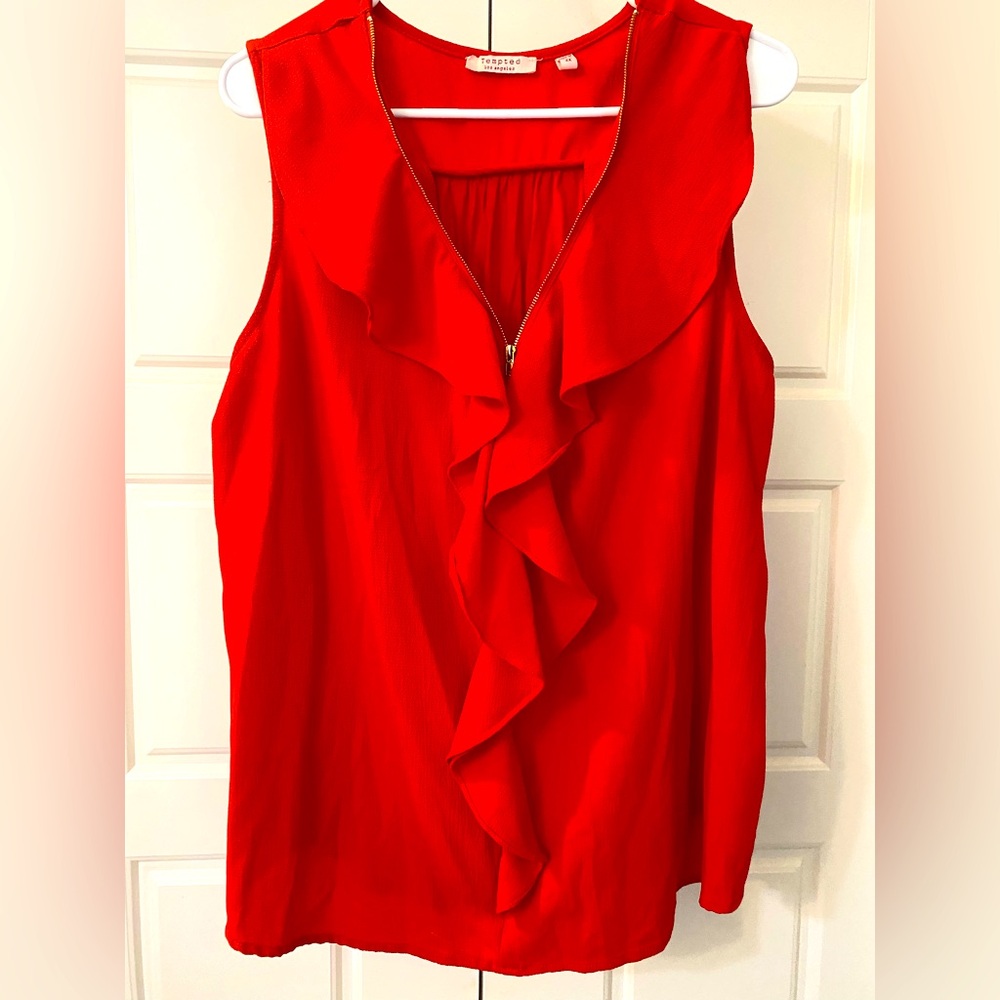 Women’s sleeveless blouse. Excellent condition. Size 2x. Vibrant red in color.